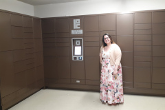 Woman about to Access Smart Package Lockers Woman about to Access Smart Package Lockers