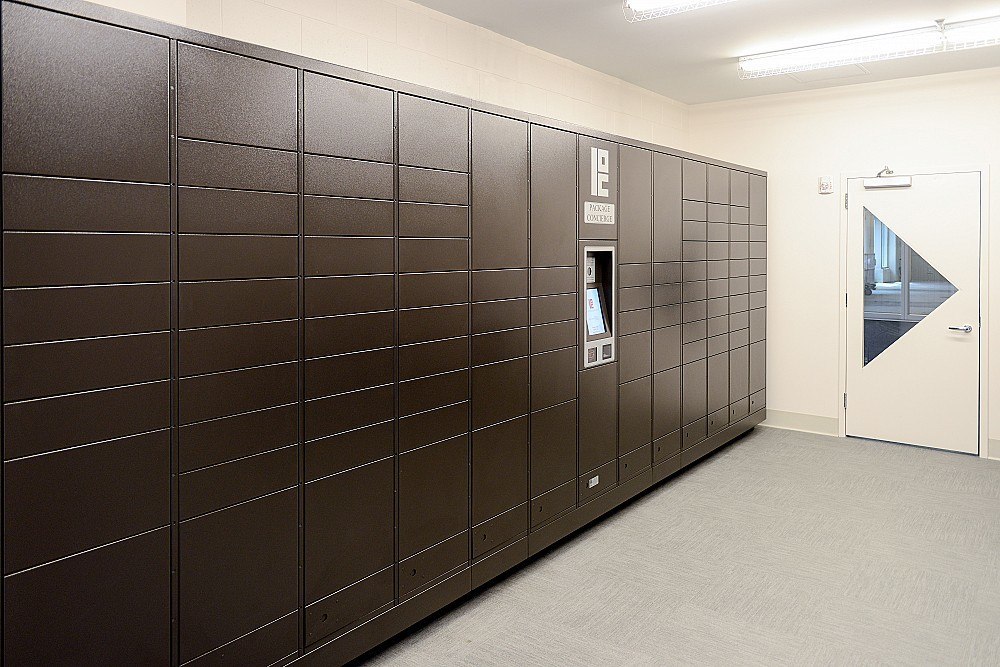 large bank of automated package lockers
