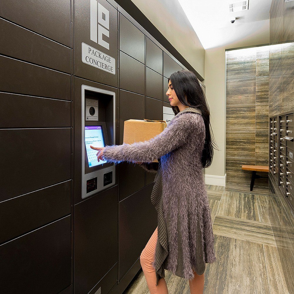 young shopper using automated package locker