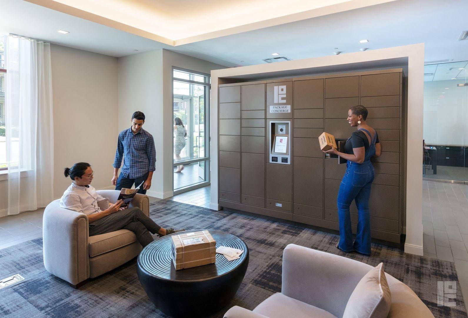 Lobby with Smart Package Locker smiling residents retrieving their packages from the smart locker system