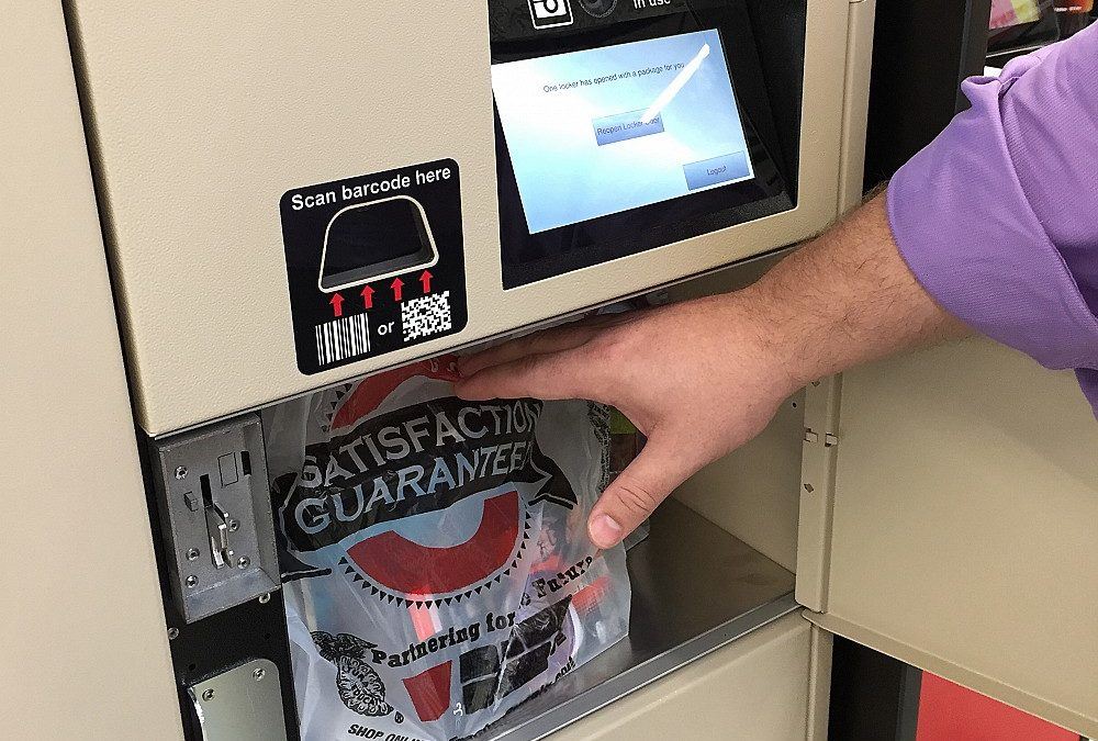 male arm reaching for package inside locker compartment