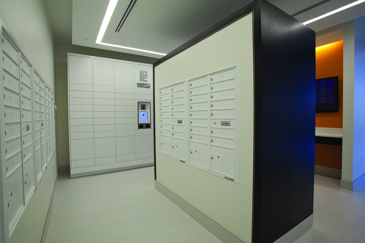 white centralized mailboxes with matching package lockers